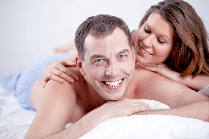 Man and woman in bed